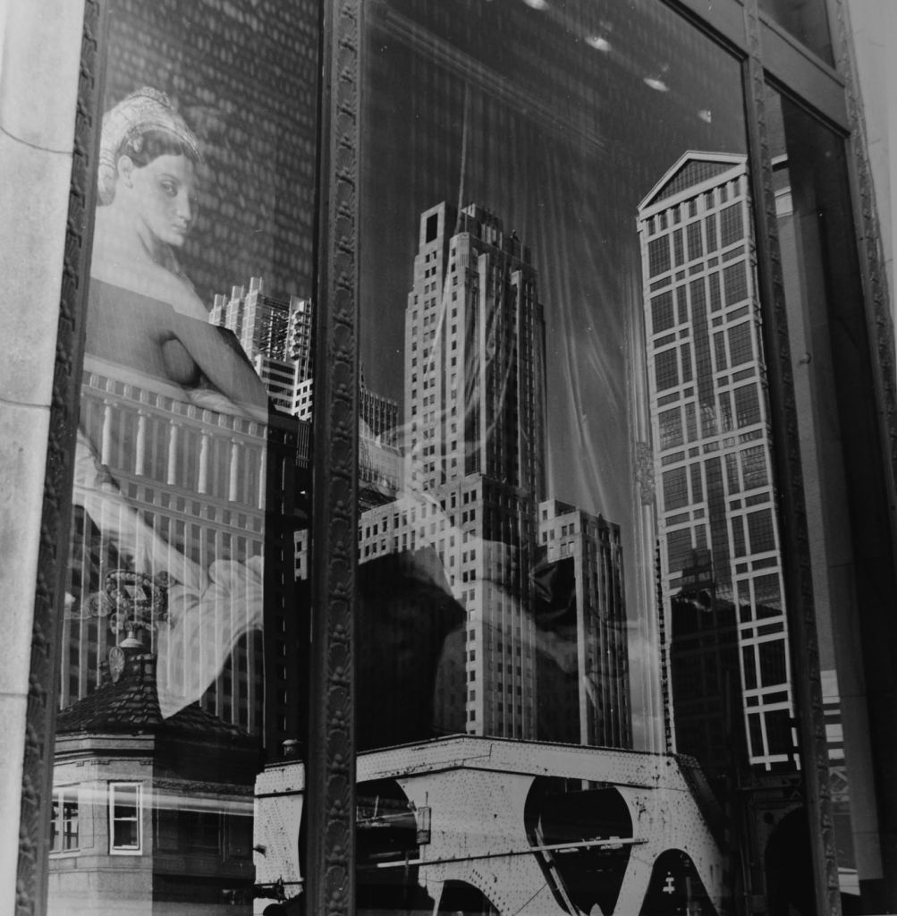 Reflections of the Chicago Structures in the Merchandise Window_ Chicago 1994